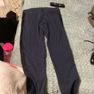 Navy blue leggings with black strip on side